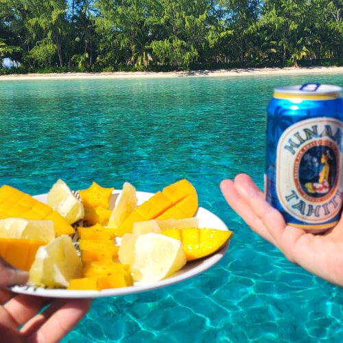 Fresh coconuts and pineapples on a tropical table