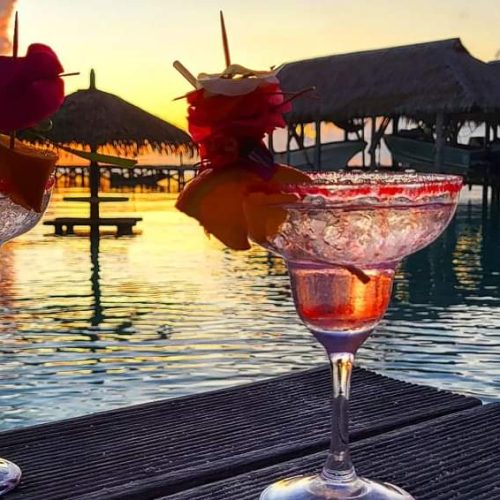 french polynesian cocktails at sunset