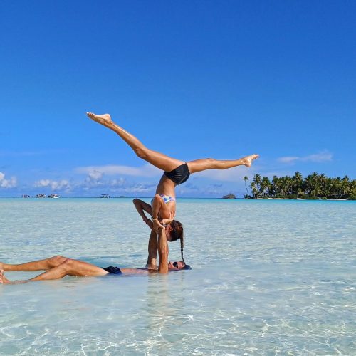 Yoga on the water at sunrise